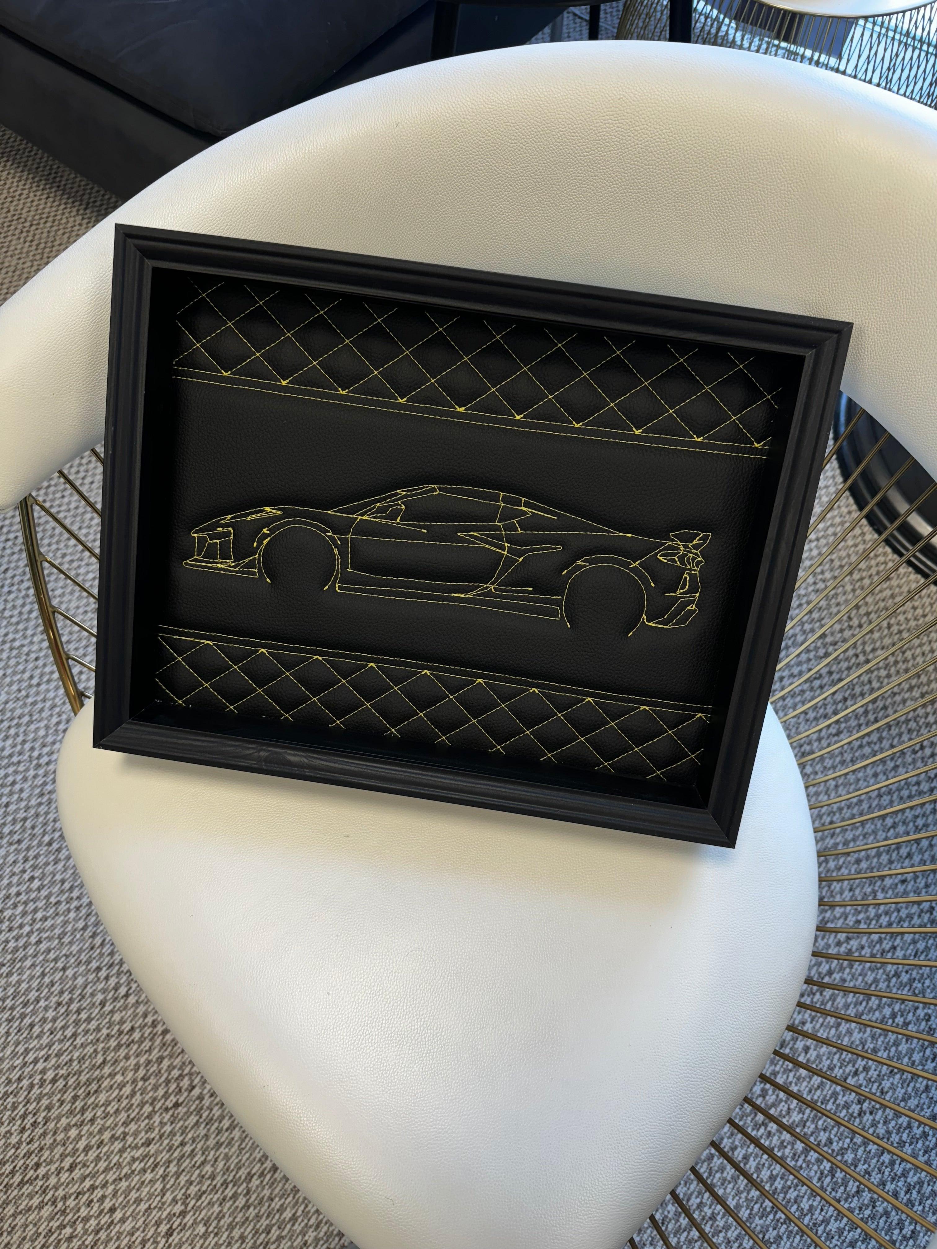 Black Leather Corvette C8 Inspired Wall Art: Embroidered Yellow Stitch - AutoWin